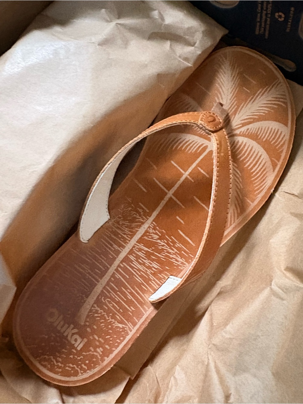 OluKai SouthShore Tan Palm-Print Leather Thong Sandals with White Insole Details